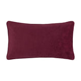 Rectangular lumbar cushion in plain burgundy velvet with a matching piped edge, shown reverse side on a plain white background.