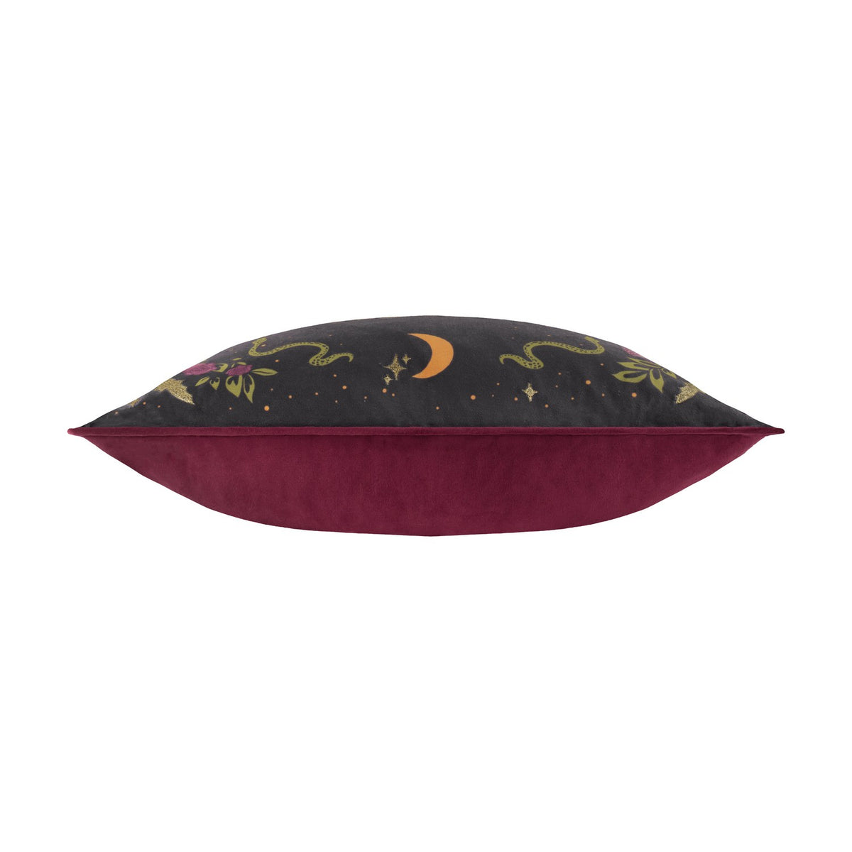 Side view of the Bad Witch Embroidered Velvet Cushion, showing a black velvet front with gold moon and star embroidery above a solid burgundy velvet back, on a white background.