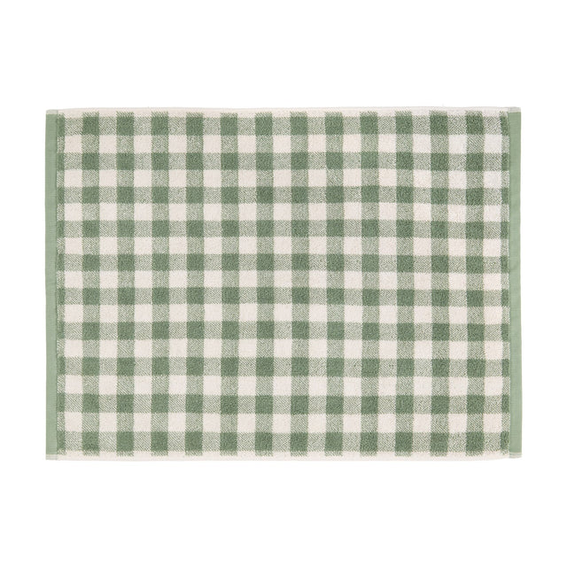 Barton Gingham Cotton Bath Mat in Forest, a rectangular cotton mat with a green and cream gingham check pattern, shown on a plain white background.