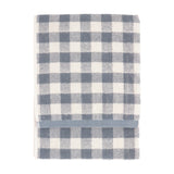 Barton Gingham Cotton Towel folded flat, showing a denim blue and cream check pattern with a woven blue stripe border, on a plain white background.
