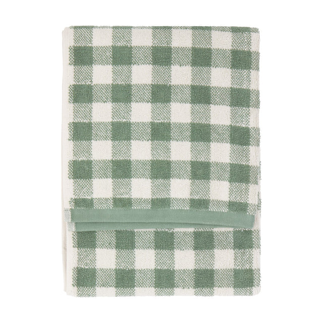 Folded Barton Gingham Cotton Towel in Forest, featuring a green and white check pattern with a plain green woven band, shown on a white background.