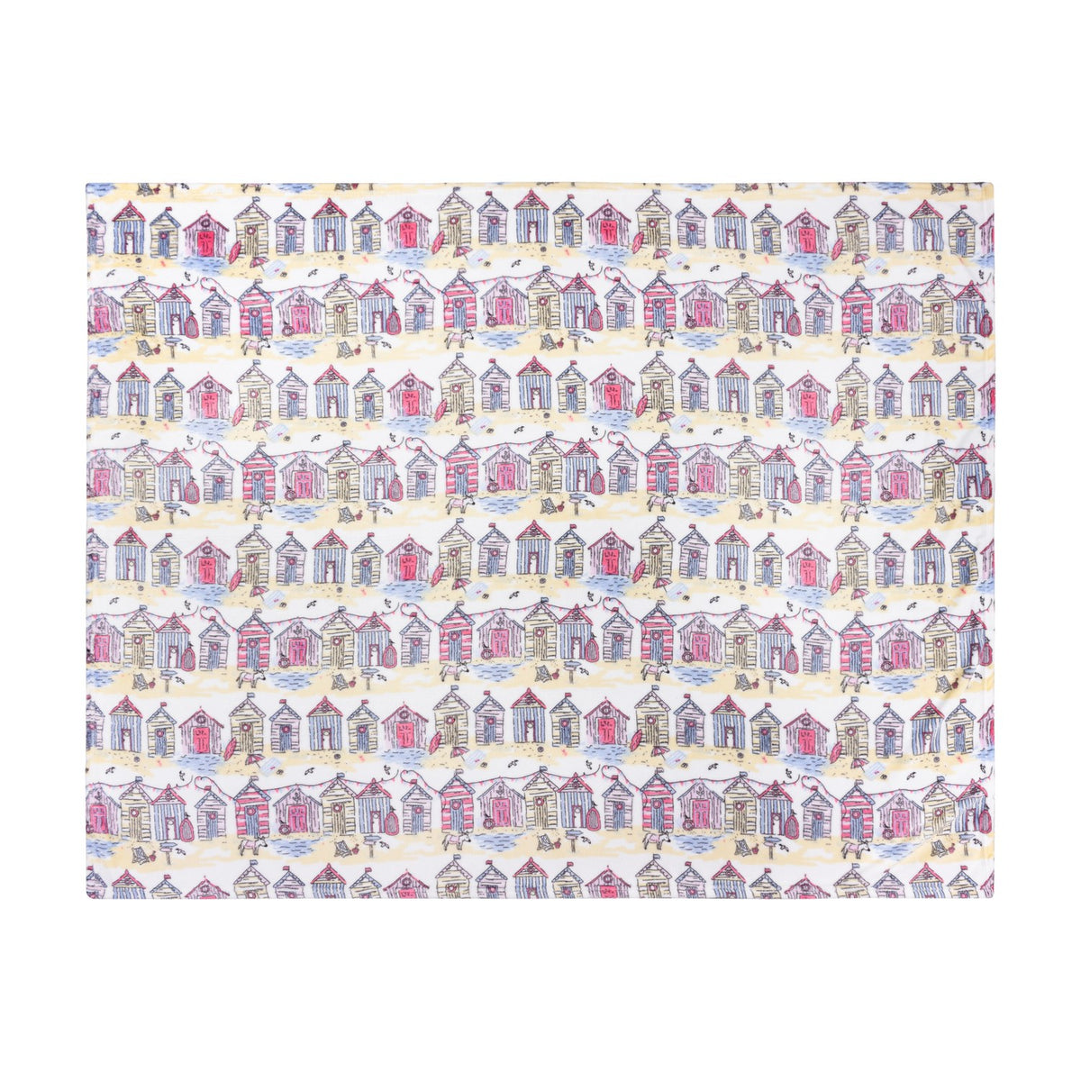 Beach Huts Printed Polyester Throw in multicoloured, featuring rows of illustrated beach huts in pink, blue, yellow and lilac on a cream ground, shown flat on a white background.