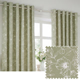 Bella Cotton Fully Lined Eyelet Curtains in sage, shown as a pair on a wooden pole beside a window, with white outline floral peony print and a matching fabric swatch inset.