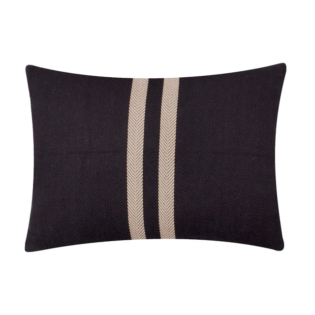 Benton Herringbone Cotton Cushion in black, rectangular with off-centre pale stripes on a woven textured ground, shown on a plain white background.