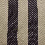 Close-up of the Benton Herringbone Cotton Cushion showing natural beige herringbone twill fabric with two dark contrast stripes running down the centre.