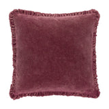 Bertie Velvet Cotton Cushion in plum-burgundy, square with frayed ruffled fringe edging and a soft heathered velvet front, shown on a plain white background.