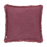 Bertie Velvet Cotton Cushion in plum/burgundy, square with frayed ruffled fringe edging, plain washed-cotton back with zip fastening, on a white background.
