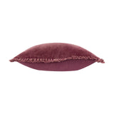 Bertie Velvet Cotton Cushion in plum/burgundy, shown side-on with frayed fringe edge and heathered velvet front against a plain white background.