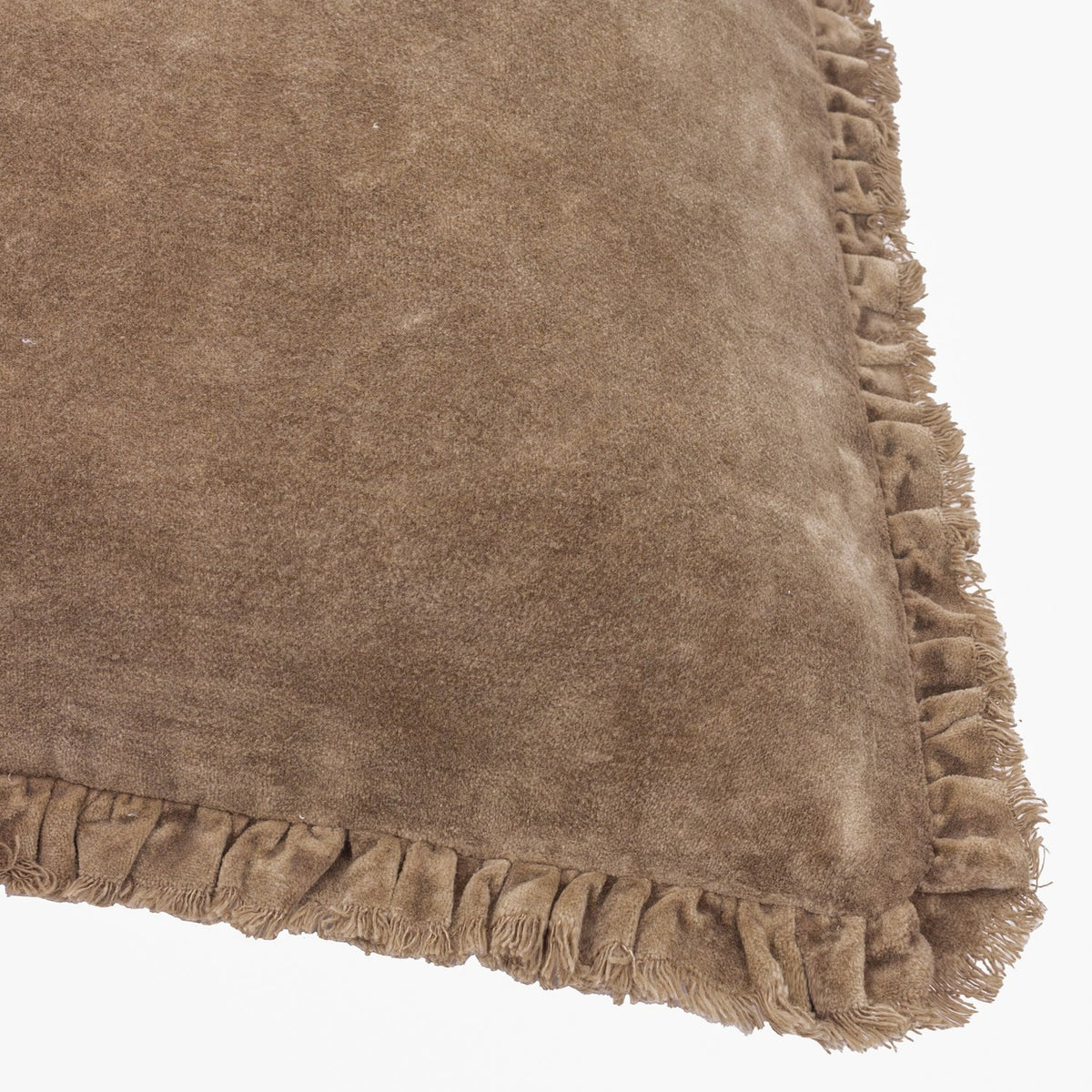 Close-up of the Bertie Velvet Cotton Cushion in chocolate brown, showing the dense velvet pile and frayed fringe edge on a plain white background.