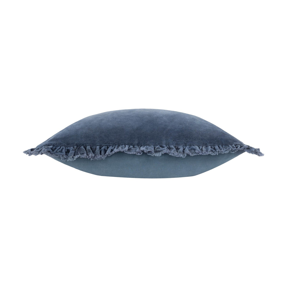 Bertie Velvet Cotton Cushion in mid blue, shown side-on with a fringed edge trim, mottled velvet front and plain cotton reverse visible, on a white background.