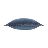 Bertie Velvet Cotton Cushion in mid blue, shown side-on with a fringed edge trim, mottled velvet front and plain cotton reverse visible, on a white background.