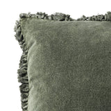 Close-up of the Bertie Velvet Cotton Cushion in moss green, showing the textured cotton velvet front and frayed fringed edge, against a plain white background.
