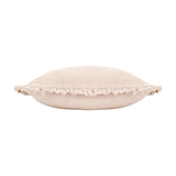 Bertie Velvet Cotton Cushion in natural, shown edge-on with frayed fringed trim along the seam, cotton velvet front and plain cotton reverse, on a plain white background.