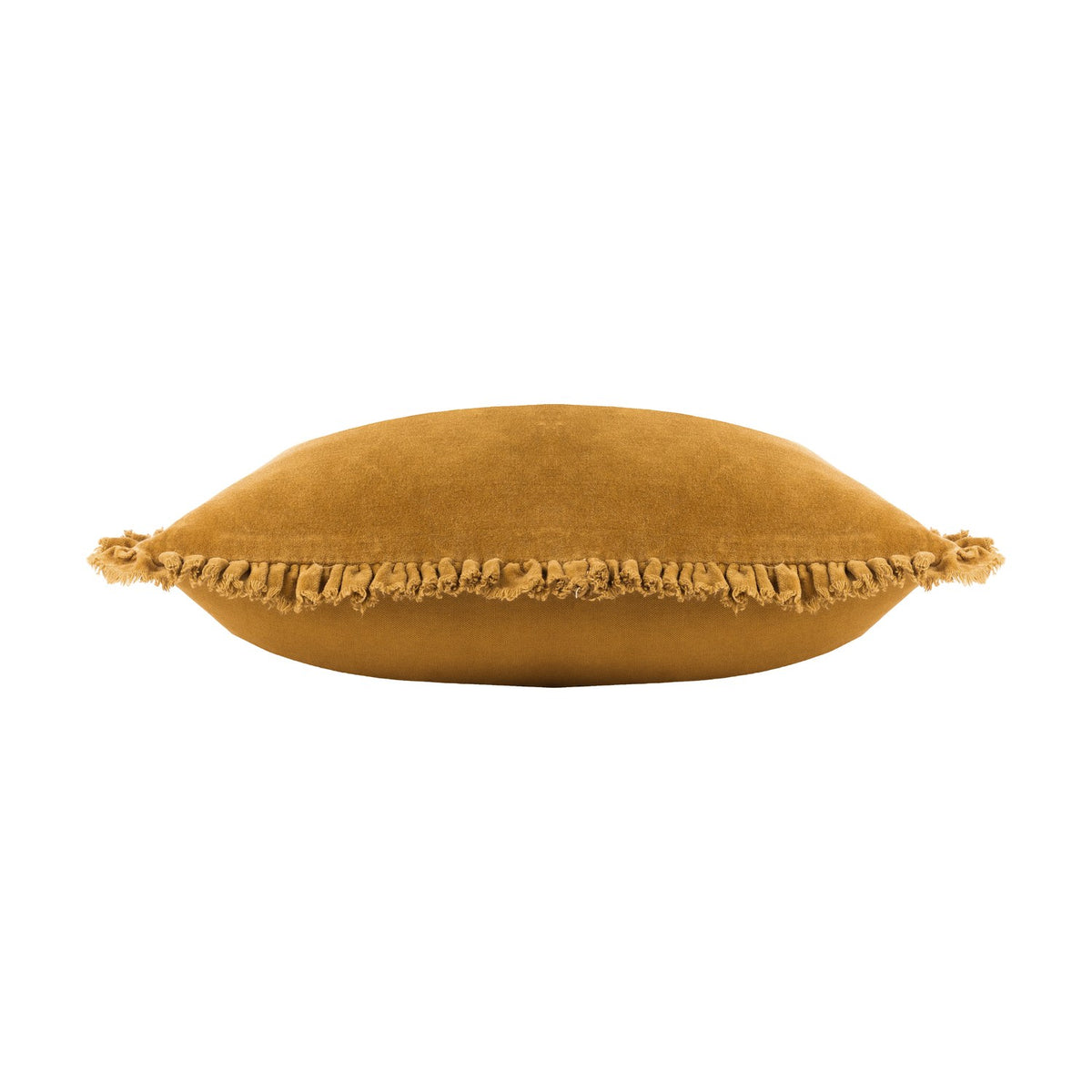 Bertie Velvet Cotton Cushion in saffron, shown side-on to reveal its plump shape and frayed fringed edge trim, set against a plain white background.