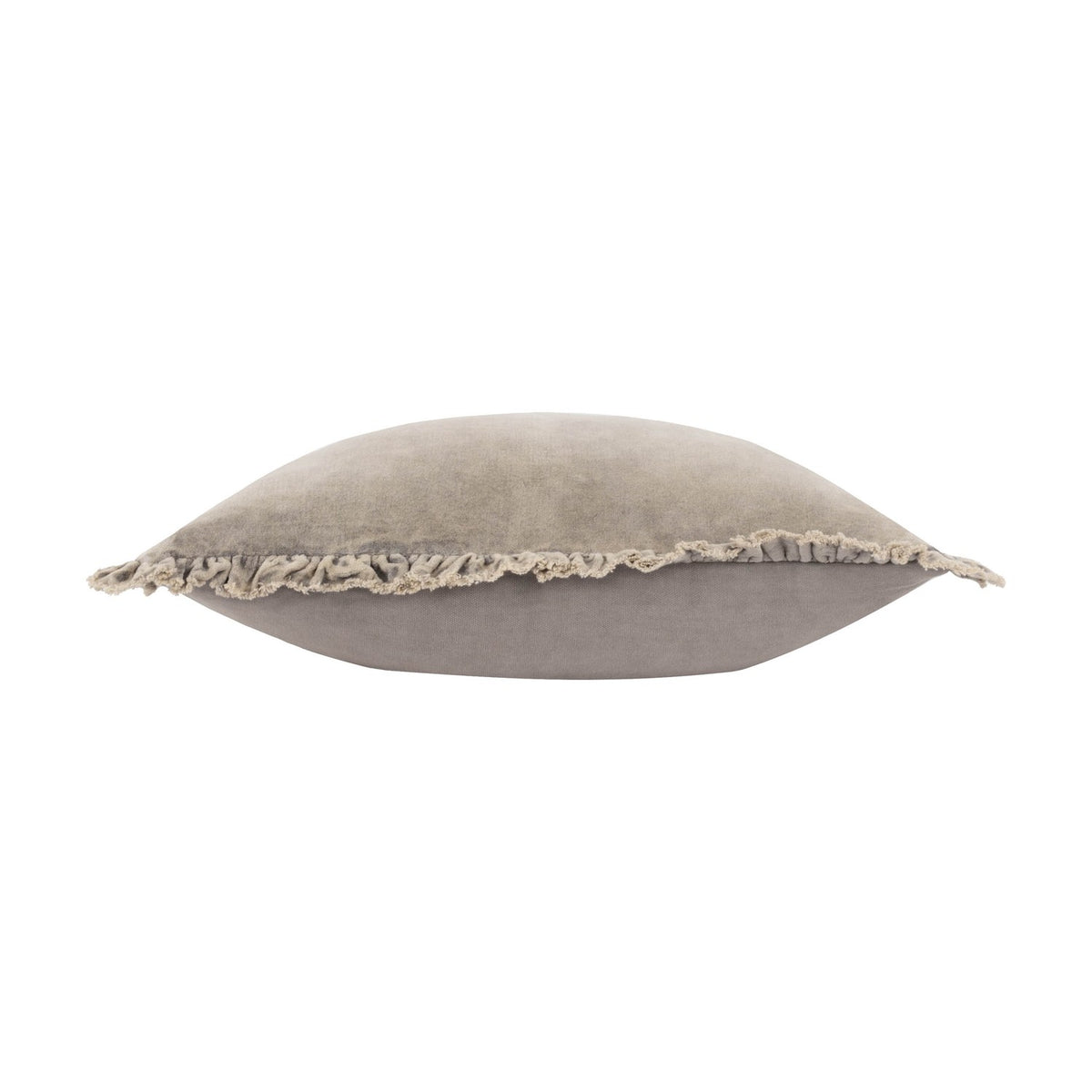 Side view of the Bertie Velvet Cotton Cushion in pale grey-taupe, showing its plump square shape and frayed, ruched edge trim against a white background.