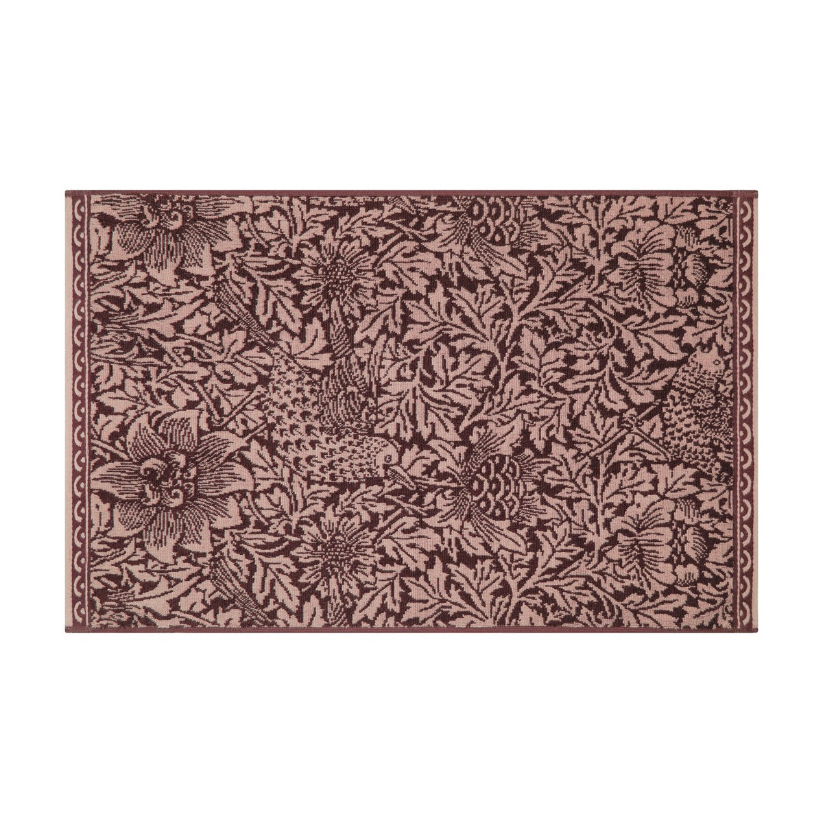 Rectangular cotton bath mat with Bird and Anemone floral pattern in two-tone plum, birds and leafy anemone motifs edge to edge, bordered trim, shown on a white background.