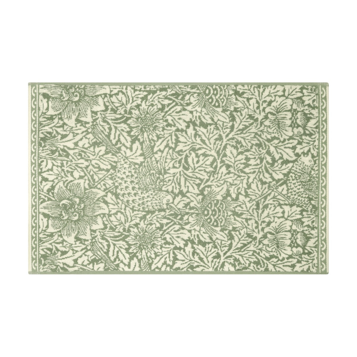 Rectangular cotton bath mat in the Bird and Anemone design, sage green birds, anemone flowers and foliage on a cream ground with a scrolled border, shown on a white background.