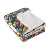 Bootanical Floral Polyester Throw folded to show teal, gold and rust floral print on one side and plush cream sherpa fleece reverse, on a plain white background.
