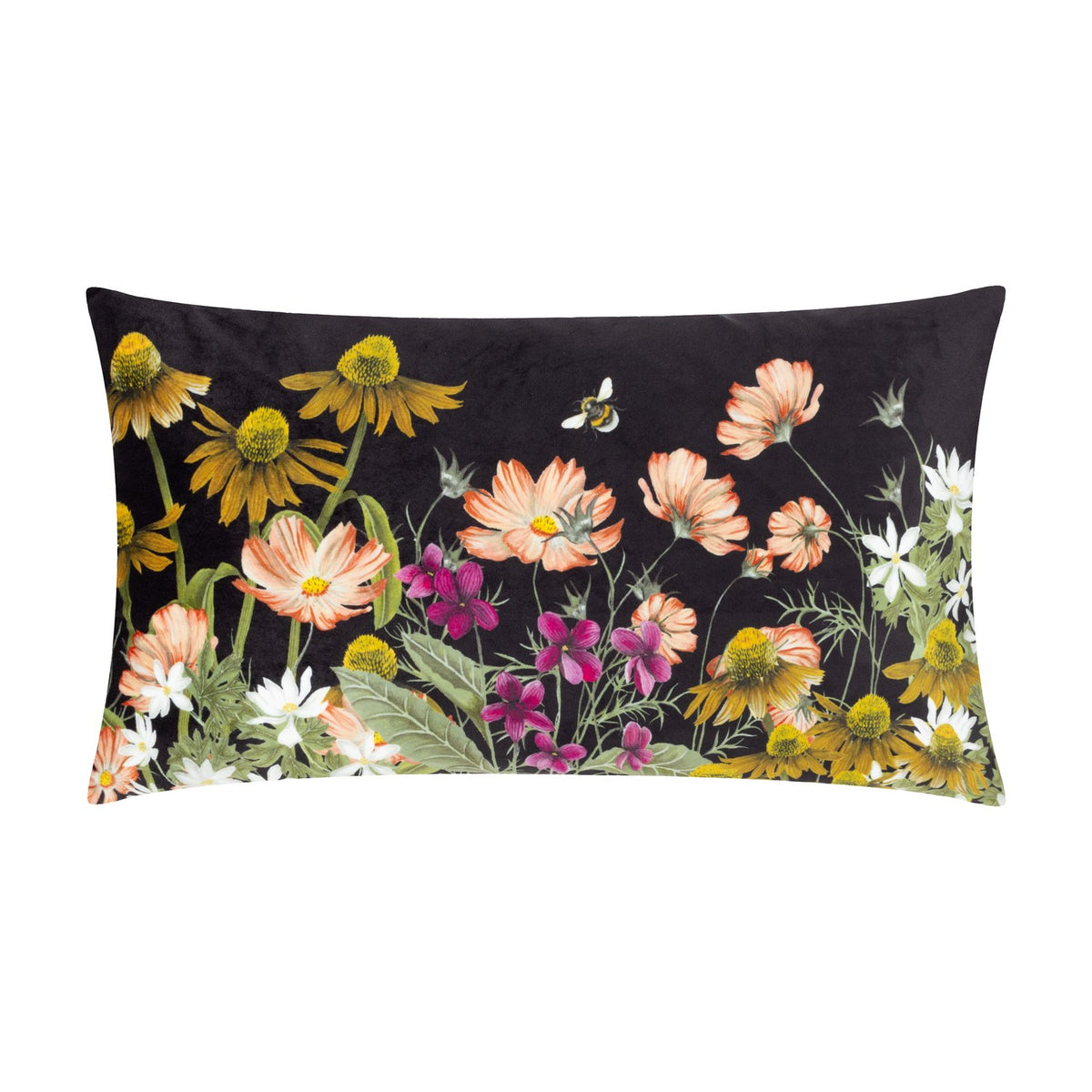 Black rectangular bolster lumbar cushion featuring a printed wildflower scene with coral cosmos, magenta blooms, white daisies, golden coneflowers and a bee, shown on a white background.