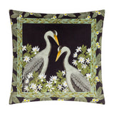 Braywick Animal Velvet Cushion in black polyester velvet, printed with two grey cranes facing each other, bordered by green leaves and white flowers on a plain background.