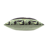 Side view of the Braywick Animal Velvet Cushion showing its plump edge with a leaf and white flower border on black velvet, backed in plain sage green, set against a white background.