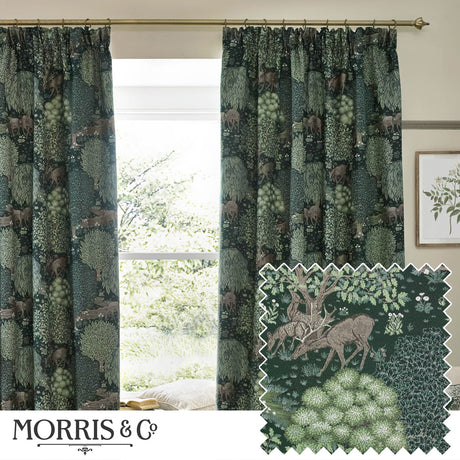 Brook Jacquard Polyester Pencil Pleat Curtains in Forest Green, hung on a brass pole by a window, showing a woven woodland scene with deer and trees, plus a fabric swatch detail.