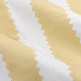 Close-up of Birdie Stripe Cotton Pencil Pleat Curtains showing wavy butter yellow and white stripes on soft, gathered cotton fabric.