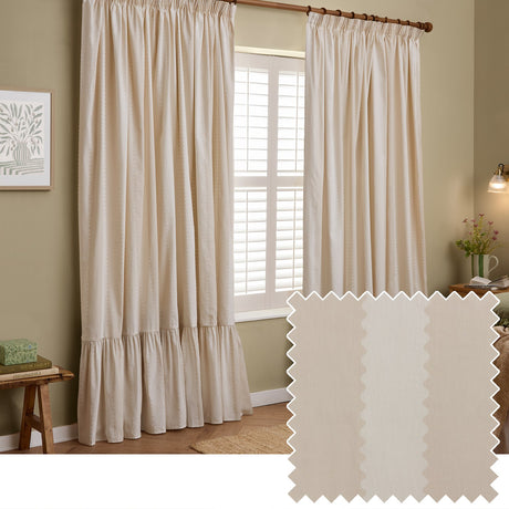 Birdie Stripe pencil pleat curtains in natural, a cotton pair with wavy contrast stripe detail and a gathered ruffle hem, shown floor-length beside a shuttered window.