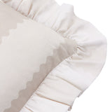 Close-up of the Birdie Stripe Frill Trim Cotton Cushion in natural, showing oatmeal scalloped stripes on cream cotton with a gathered ruffle edge.