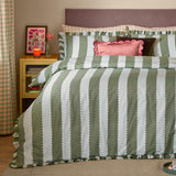 Birdie Stripe Printed Frill Trim Duvet Cover Set in baygreen/mist, showing broad green and white stripes with scalloped edging and ruffled trim, styled on a bed with pink and brown accent cushions.