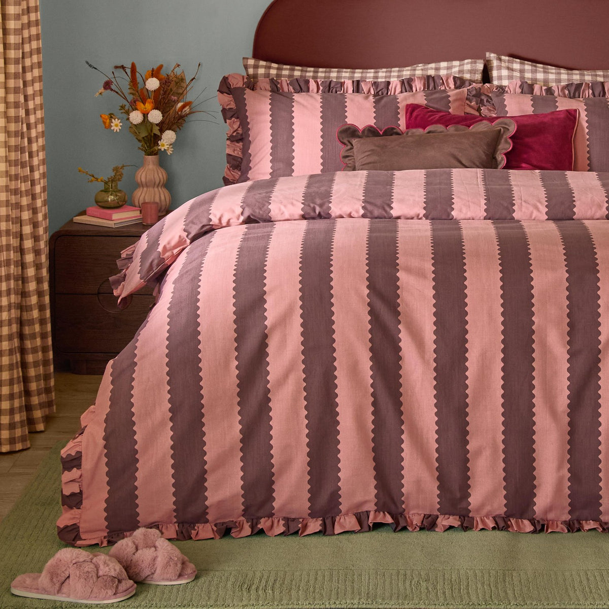 Birdie Stripe Printed Frill Trim Duvet Cover Set in Rose/Chocolate, styled on a bed with scalloped striped print, gathered frill edge, and matching pillowcases in a bedroom setting.