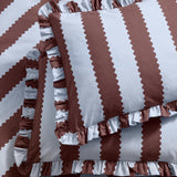 Birdie Stripe cotton blend pillowcase pair in blue and chocolate, featuring bold vertical stripes with scalloped edging and gathered ruffle trim on each side.