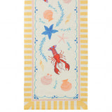 Brunch Stripes polyester table runner with cream centre, scalloped border and yellow stripe edges, printed with a red lobster, blue starfish and coral shells.