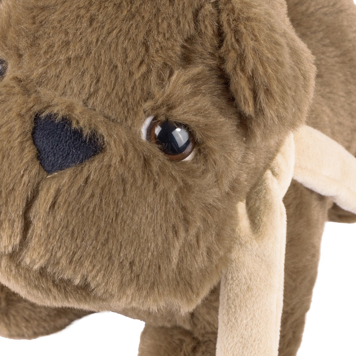 Close-up of the Buddy Weighted Faux Fur Door Stop in brown, showing the bulldog's face with a navy heart-shaped patch, glass eye, and cream scarf against a white background.