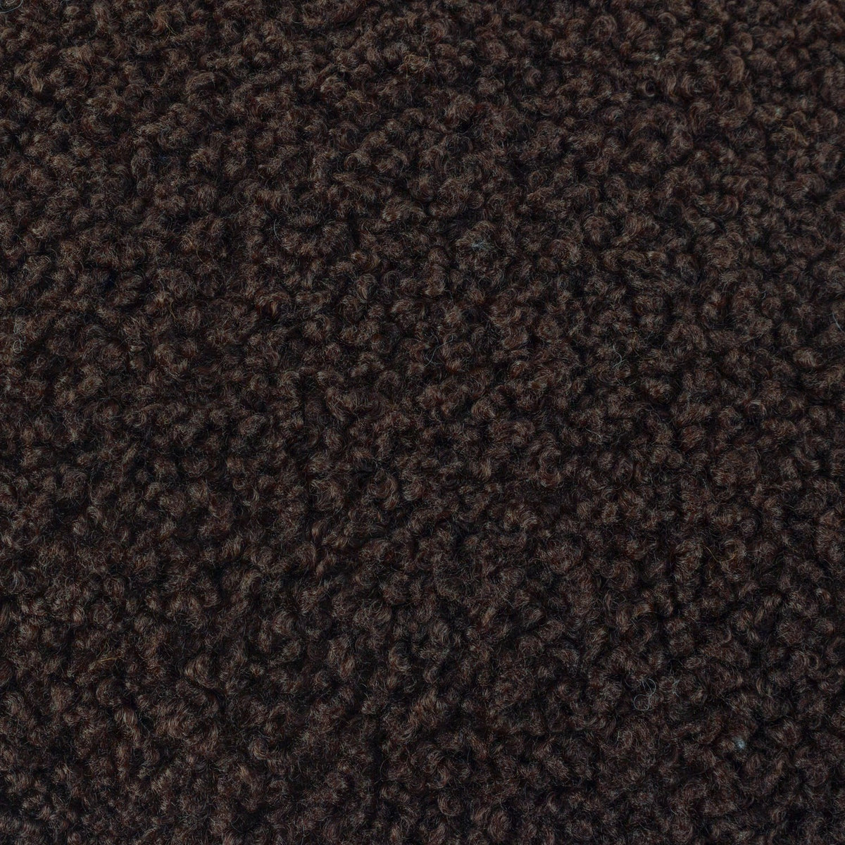 Close-up of the Cabu Plain Polyester Cushion in dark chocolate brown, showing dense looped boucle texture in a square design.