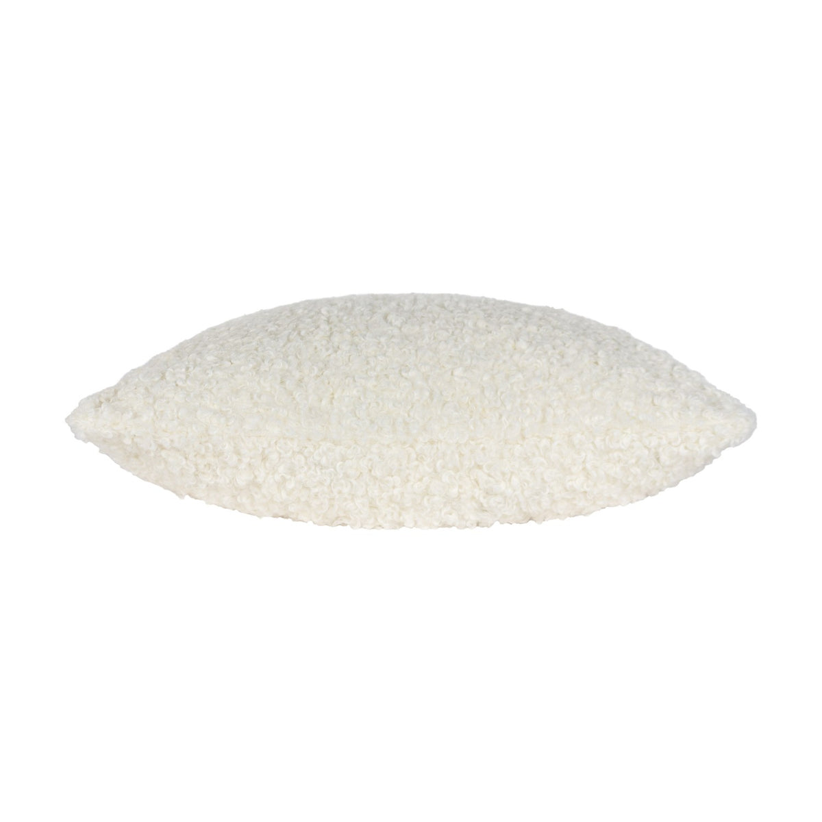 Side view of the Cabu Reversible Wool Cushion in cream boucle fabric with a textured, curled pile, shown on a plain white background.