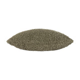 Side view of the Cabu Reversible Wool Cushion in khaki, showing its textured bouclé fabric and plump square shape against a white background.