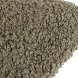 Close-up of the Cabu Reversible Wool Cushion in khaki, showing its all-over curled bouclé texture in a muted green polyester fabric.