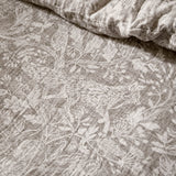 Cademuir Cotton Woodland Duvet Cover Set in Nut, close-up of muslin cotton fabric with fox, birds and foliage toile print in off-white on nutmeg-brown.