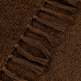 Close-up of the Candar Plain Polycotton Throw in cocoa brown, showing its bouclé-textured weave and knotted fringe edge.