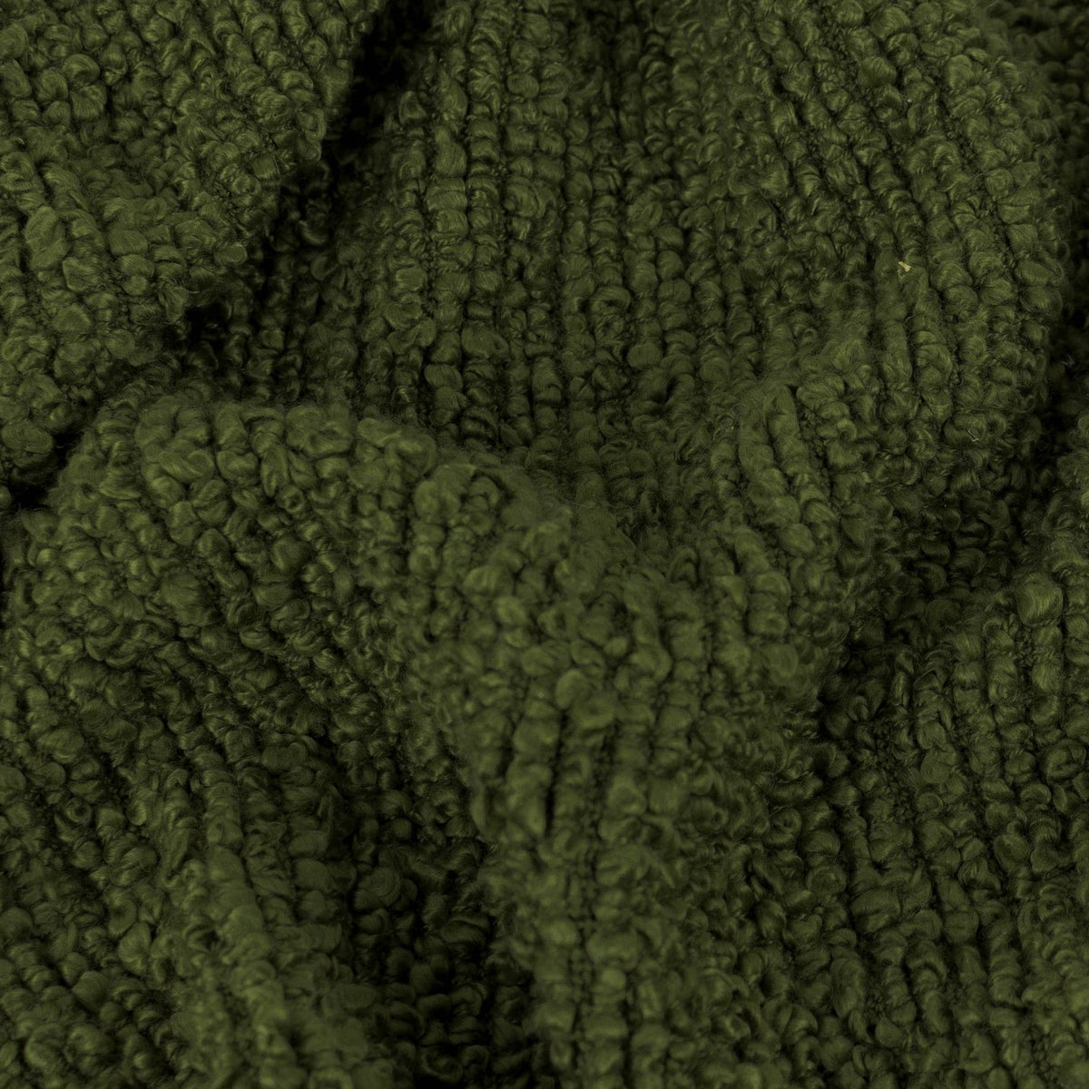 Close-up of the Candar Plain Polycotton Throw in khaki green, showing its boucle-textured, loop-woven fabric surface.