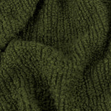 Close-up of the Candar Plain Polycotton Throw in khaki green, showing its boucle-textured, loop-woven fabric surface.