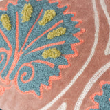 Close-up of the Casa Velvet Cotton Cushion in rose, showing embroidered teal frond pattern with coral outlines and raised chartreuse yarn tufts on velvet.