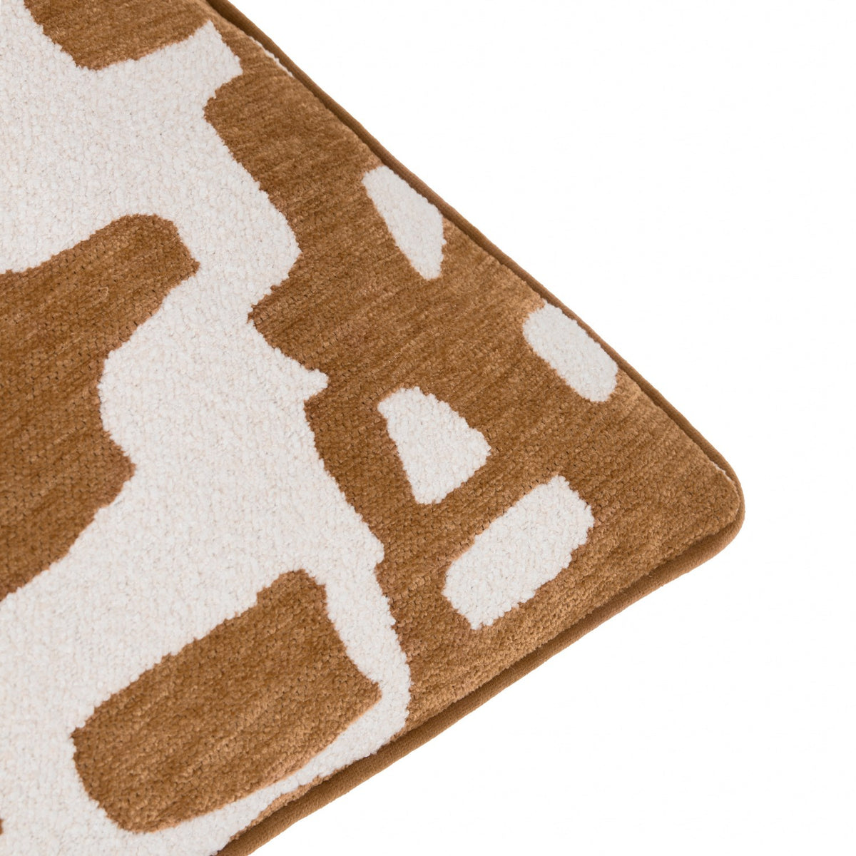 Close-up of the Caval Velvet Chenille Cushion in bronze, showing an abstract jacquard pattern with bronze forms on a cream ground, contrasting boucle and chenille textures, on a white background.