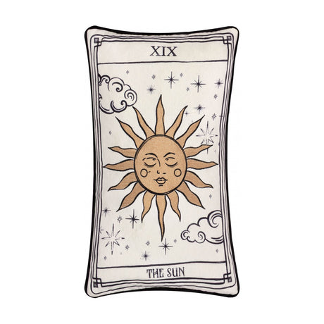 Rectangular Celestial Stories linen cotton cushion in cream with black piping, embroidered tarot-style Sun card design featuring a sun face, rays, stars and clouds, on a white background.