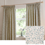 Cervino pencil pleat curtains in duck egg on a wooden pole by a window, cream jacquard fabric with trailing leaf design in blue, sage and tan, shown with a fabric swatch.