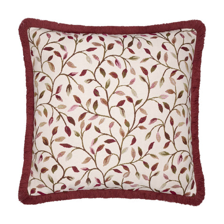 Cervino Jacquard Cotton Blend Cushion in Damson, square with dusky red fringe trim, cream ground featuring trailing leaf pattern in wine, pink, green and tan tones, shown on a white background.