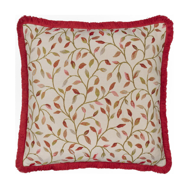 Cervino Jacquard Cotton Blend Cushion in Rednut, square with red brush fringe trim, cream ground featuring a woven trailing leaf pattern in rust, pink and green, on a plain white background.
