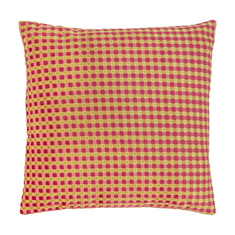 Square velvet cushion in a checkered pattern of hot pink and gold cut-velvet squares, shown on a plain white background.