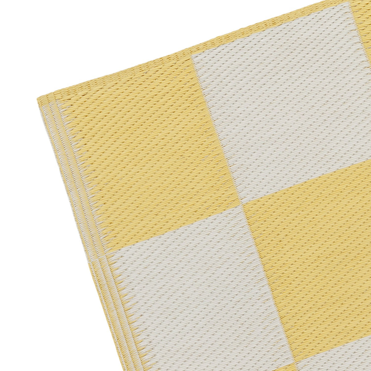 Close-up of the Checkerboard Jacquard Check Rug in yellow, showing woven polypropylene texture in a bold yellow and off-white checkerboard pattern with a finished edge.